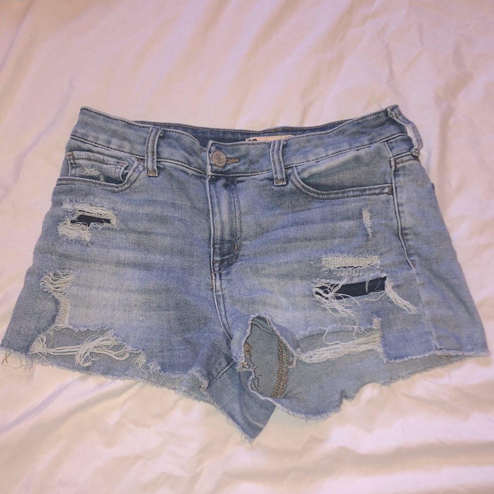 The color is a light blue, and the size is a 11/30w high rise, shortie shorts.